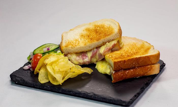 Enjoy a selection of snacks including a toastie!